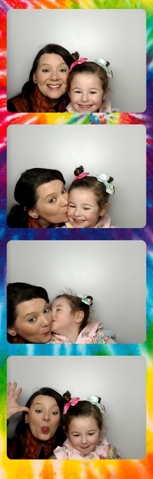 Photo booth strip of Amanda and her daughter making silly faces